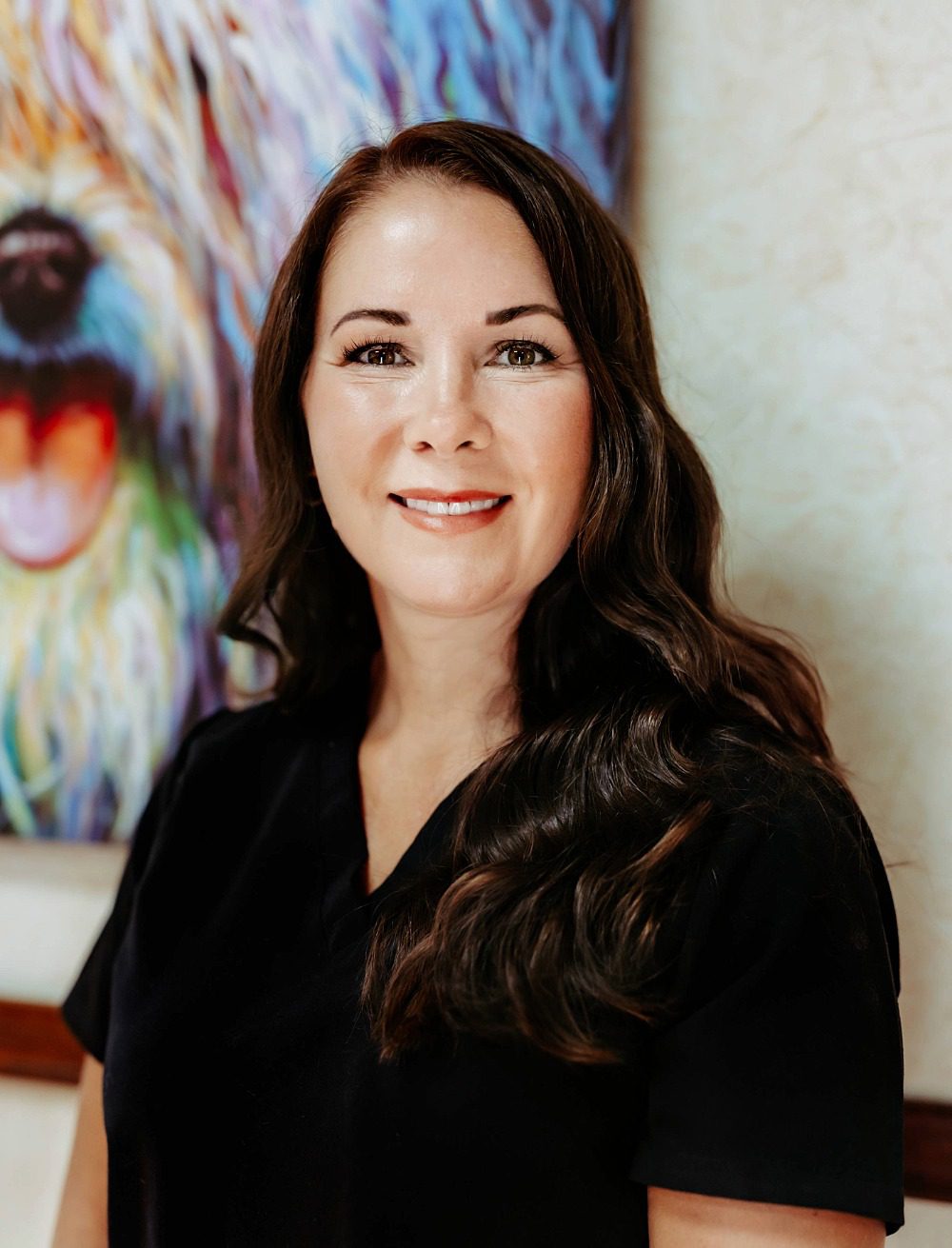 Dr. Billie Rush - female veterinarian with long brown hair